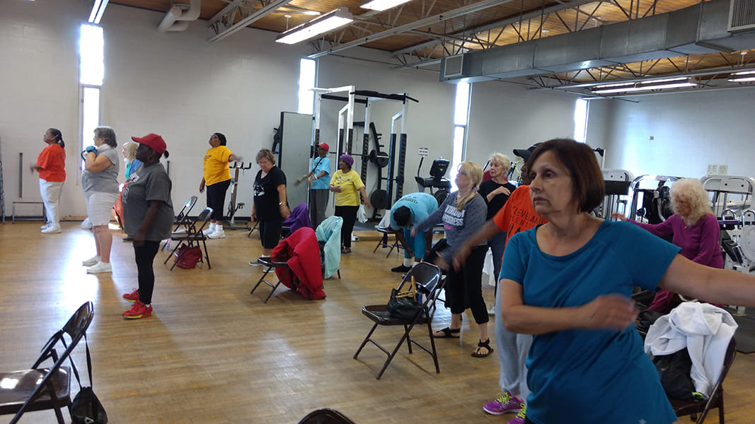 Rose Centers participants engaged in a group fitness class at a workout facility
