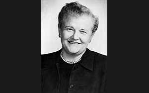 Margaret Blenkner, the first research director at Benjamin Rose Institute on Aging, smiling in headshot